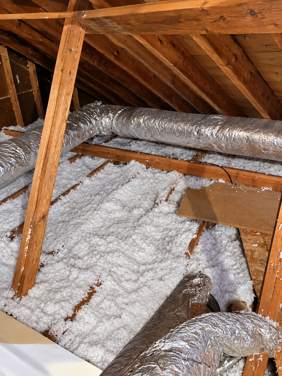 Even blown-in insulation depth across an attic floor